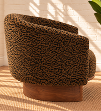 Load image into Gallery viewer, Melinda brown leopard print accent chair with rounded wraparound back, curved arms, deep upholstered seat, and sculptural silhouette.
