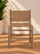 Load image into Gallery viewer, Meryll Natural Brown dining chair with vintage saddle brown vegan leather and solid walnut-finished wood frame