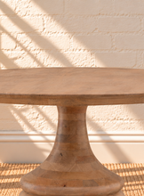 Load image into Gallery viewer, Micah natural mango wood round dining table with circular top and sculptural tapered pedestal base.