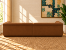 Load image into Gallery viewer, Monica 2-piece sectional sofa in Caramel velvet with deep horizontal channel tufting, curved arms, and contemporary design.