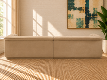 Load image into Gallery viewer, Monica 2-piece sectional sofa in Honey Beige velvet with deep horizontal channel tufting, curved arms, and contemporary design.