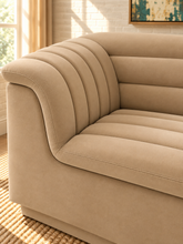 Load image into Gallery viewer, Monica 2-piece sectional sofa in Honey Beige velvet with deep horizontal channel tufting, curved arms, and contemporary design.