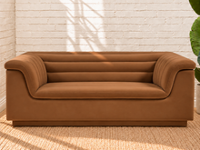 Load image into Gallery viewer, Image 1 of 4: Monica upholstered loveseat in Caramel velvet with deep channel tufting and curved arms