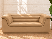 Load image into Gallery viewer, Image 1 of 4: Monica upholstered loveseat in Honey Beige velvet with deep channel tufting and curved arms