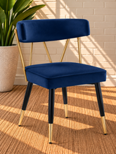 Load image into Gallery viewer, Morse dining chair in Royal Navy velvet with matte black metal legs and gold frame and leg tip details