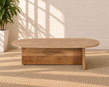 Load image into Gallery viewer, Myan freeform coffee table with beige travertine stone top and solid mango wood architectural base.
