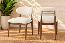 Load image into Gallery viewer, Nancy dining chair upholstered in Oat Milk performance fabric with Brown Walnut Ash Wood frame and brushed brass accents