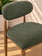 Load image into Gallery viewer, Nancy dining chair upholstered in Vintage Olive performance fabric with Brown Walnut Ash Wood frame and brushed brass accents