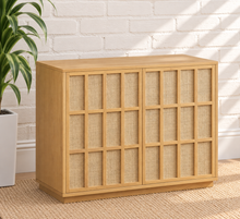 Load image into Gallery viewer, Naomi natural ash wood bar cabinet with two woven geometric-panel doors and recessed plinth base