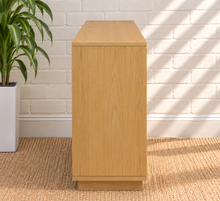 Load image into Gallery viewer, Naomi natural ash wood bar cabinet with two woven geometric-panel doors and recessed plinth base