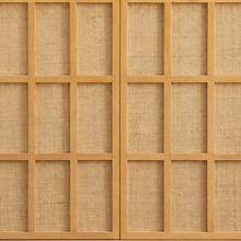 Load image into Gallery viewer, Naomi natural ash wood bar cabinet with two woven geometric-panel doors and recessed plinth base