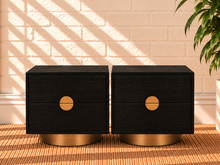 Load image into Gallery viewer, Pair of Jimena charcoal two-drawer nightstands with oak veneer and brushed brass metal bases and handles.