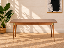 Load image into Gallery viewer, Image 2 of 4: Perez Walnut dining table with natural wood top, splayed Walnut legs, and Brass tube accents