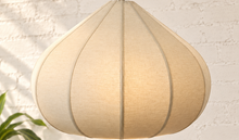 Load image into Gallery viewer, Poppy hanging lamp in sand with a rounded sculptural shade, textured surface, vertical rib detailing, and metal chain suspension.