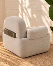 Load image into Gallery viewer, Quentin ivory gray upholstered accent chair with rounded arms, textured fabric and antique brass-finished metal accents.