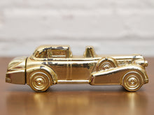 Load image into Gallery viewer, Vintage AVON Solid Gold Cadillac 6 Oz Bottle Wild Country Cologne