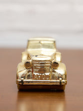 Load image into Gallery viewer, Vintage AVON Solid Gold Cadillac 6 Oz Bottle Wild Country Cologne