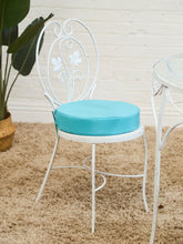 Load image into Gallery viewer, Vintage Wrought Iron Patio Dining Table with Leaf Motif Aqua Cushions and Glass Top