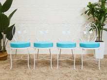 Load image into Gallery viewer, Vintage Wrought Iron Patio Dining Table with Leaf Motif Aqua Cushions and Glass Top
