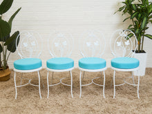 Load image into Gallery viewer, Vintage Wrought Iron Patio Dining Table with Leaf Motif Aqua Cushions and Glass Top