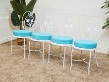 Load image into Gallery viewer, Vintage Wrought Iron Patio Dining Table with Leaf Motif Aqua Cushions and Glass Top