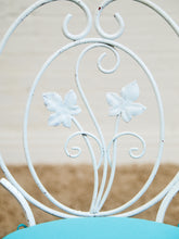 Load image into Gallery viewer, Vintage Wrought Iron Patio Dining Table with Leaf Motif Aqua Cushions and Glass Top