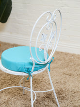 Load image into Gallery viewer, Vintage Wrought Iron Patio Dining Table with Leaf Motif Aqua Cushions and Glass Top
