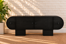 Load image into Gallery viewer, Saige 4-Door Capsule Buffet Credenza in Charcoal with rounded silhouette, round knobs, sculptural legs, and interior shelving