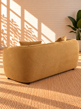 Load image into Gallery viewer, Image 5 of 5: Savino upholstered loveseat in Warm Ochre fabric with rounded shelter arms, channel back detailing, and plush two-seat cushions