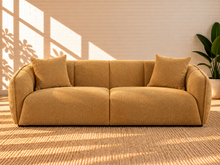 Load image into Gallery viewer, Image 1 of 5: Savino upholstered sofa in Warm Ochre fabric with rounded shelter arms, channel back detailing, and broad cushioned seats