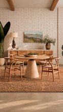 Load image into Gallery viewer, Sculptural blonde tone dining chair with curved wood back, central cutout splat and natural woven cord seat.