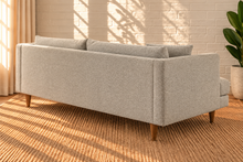 Load image into Gallery viewer, Image 4 of 5: Shelby upholstered sofa in Stone Mist boucle fabric with deep lounge seating, loose cushions, and tapered Rubberwood legs