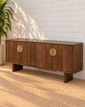 Load image into Gallery viewer, Stefan natural brown mango wood credenza with fluted cabinet doors, round cork handles, four-door storage, and wood legs.
