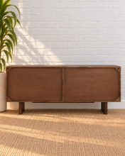 Load image into Gallery viewer, Stefan natural brown mango wood credenza with fluted cabinet doors, round cork handles, four-door storage, and wood legs.