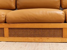 Load image into Gallery viewer, Early 1980’s Italian Sofa with Caning Detail and New Leather Upholstery