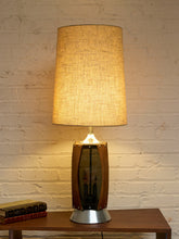 Load image into Gallery viewer, Vintage Mid-Century Table Lamp featuring Sculptural Wood Frame, Smoked Glass Panels, Metal Base and Tall Neutral Fabric Shade
