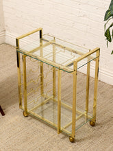 Load image into Gallery viewer, Vintage Hollywood Regency Brass Bar Cart with Glass Shelves
