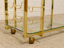 Load image into Gallery viewer, Vintage Hollywood Regency Brass Bar Cart with Glass Shelves