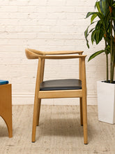 Load image into Gallery viewer, Modern Sculptural Oak Horseshoe Armchair with Black Seat