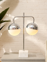 Load image into Gallery viewer, 70s style table lamp with two chrome and frosted glass globe shades on an adjustable chrome frame with white marble base.
