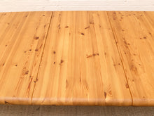 Load image into Gallery viewer, A close-up view of a light natural wood tabletop or shelf made of three long planks with visible grain, knots, and warm honey tones, photographed indoors against a white wall and light rug.