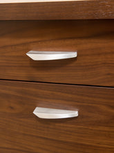 Load image into Gallery viewer, Close-up of two wooden drawers with modern curved silver metal handles, showing a warm brown wood grain finish.