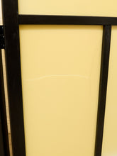 Load image into Gallery viewer, A close-up of a cream-colored panel with a black wooden frame, showing a small horizontal scratch or mark on the surface.