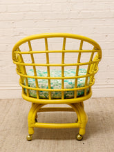 Load image into Gallery viewer, Image 11 of 20: Set of four vintage bright yellow rattan barrel chairs with floral cushions, alternate view 6