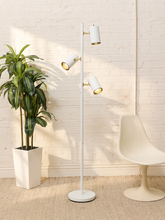 Load image into Gallery viewer, Vintage white metal floor lamp with three adjustable cylindrical spotlights on a slim vertical stem and round base