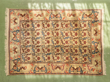 Load image into Gallery viewer, Vintage hand-knotted silk area rug with ivory field, repeating Herati floral pattern, coral and blue details, and decorative border.