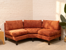 Load image into Gallery viewer, Vintage Dunbar three-seat sofa in textured rust upholstery with loose back cushions, slim arms, and dark legs