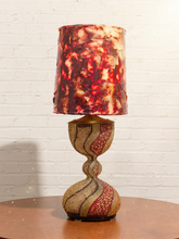 Load image into Gallery viewer, Vintage sculptural table lamp with beaded amber red and cream body and oversized textured amber and burgundy shade