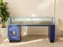 Load image into Gallery viewer, 1960s vintage jewelry display case with long glass showcase, pedestal base, and decorative gold detailing