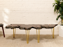 Load image into Gallery viewer, Vintage freeform live edge wood slab coffee table with rugged natural edges and brass-tone hairpin legs
